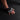 Person wearing xpeed hyper flex training gloves on a rubber tile